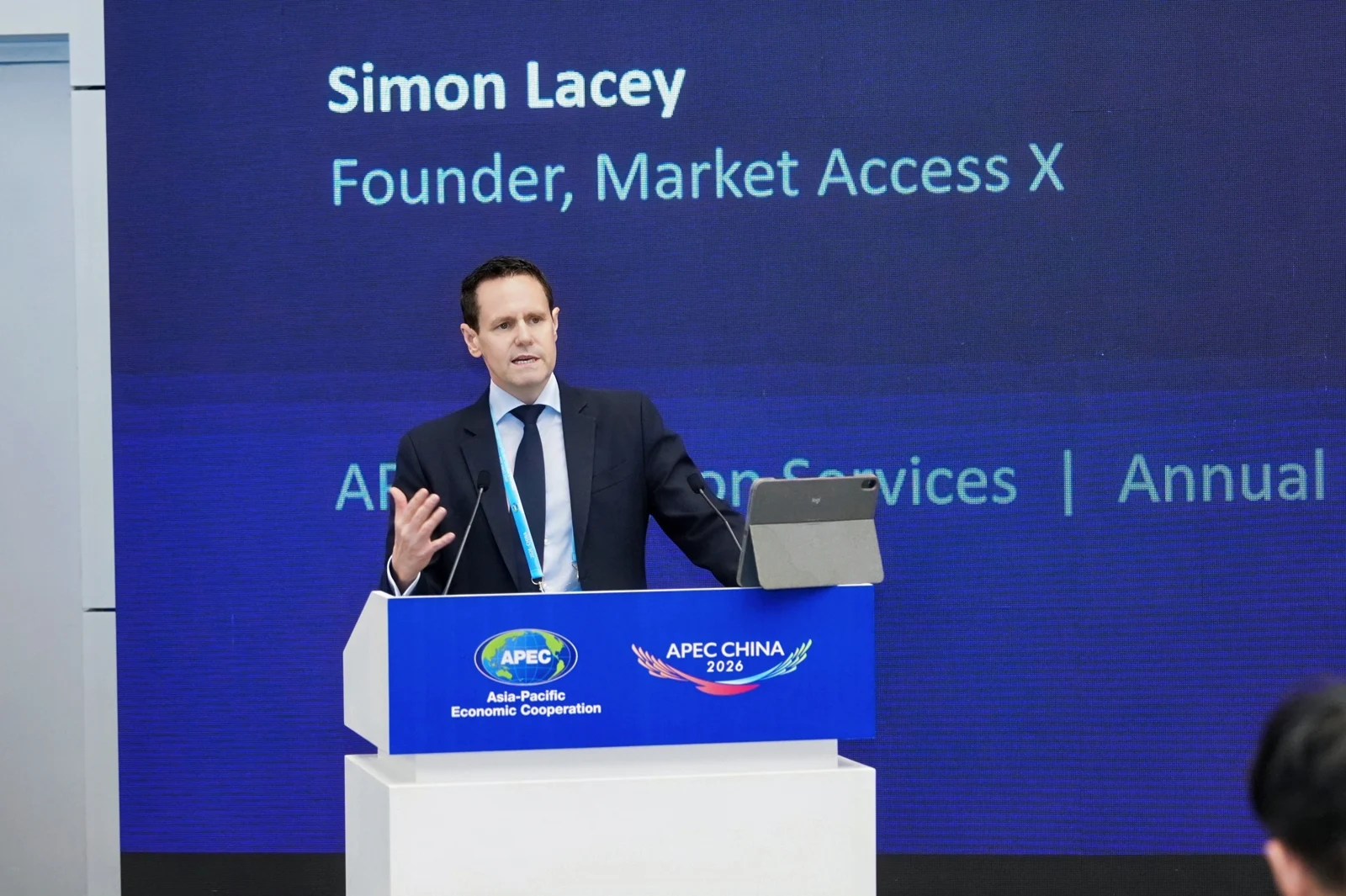 Simon Lacey speaking at an APEC event