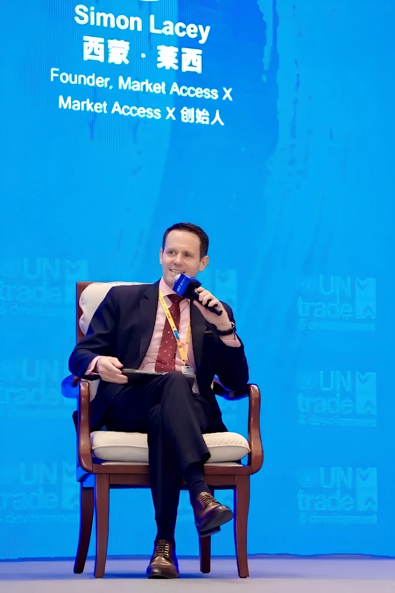 Simon Lacey speaking on a panel in Xiamen